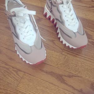 Christian Louboutin Loubishark sneakers are crafted of luxe leather